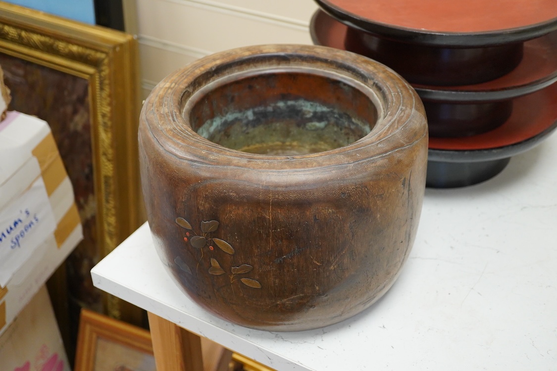 A Japanese lacquered paulownia wood hibachi, 20.5cm high and three Burmese lacquer stands